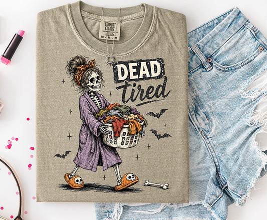 Dead Tired DTF transfer featuring funny skeleton mom in purple robe carrying laundry with bats bones and Halloween details