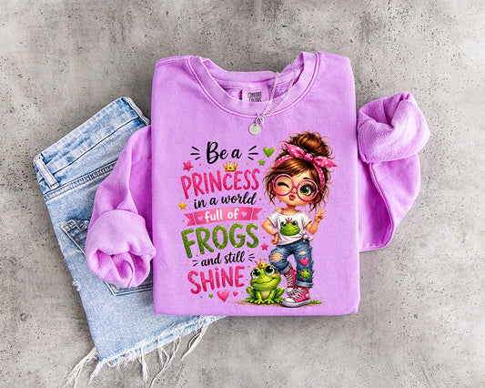 Be a Princess in a World Full of Frogs and Still Shine DTF transfer with trendy girl pink bow glasses and cute green frog