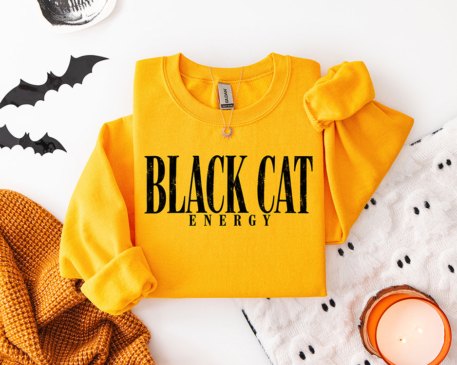 Black Cat Energy DTF transfer with bold distressed black typography for trendy minimalist Halloween apparel