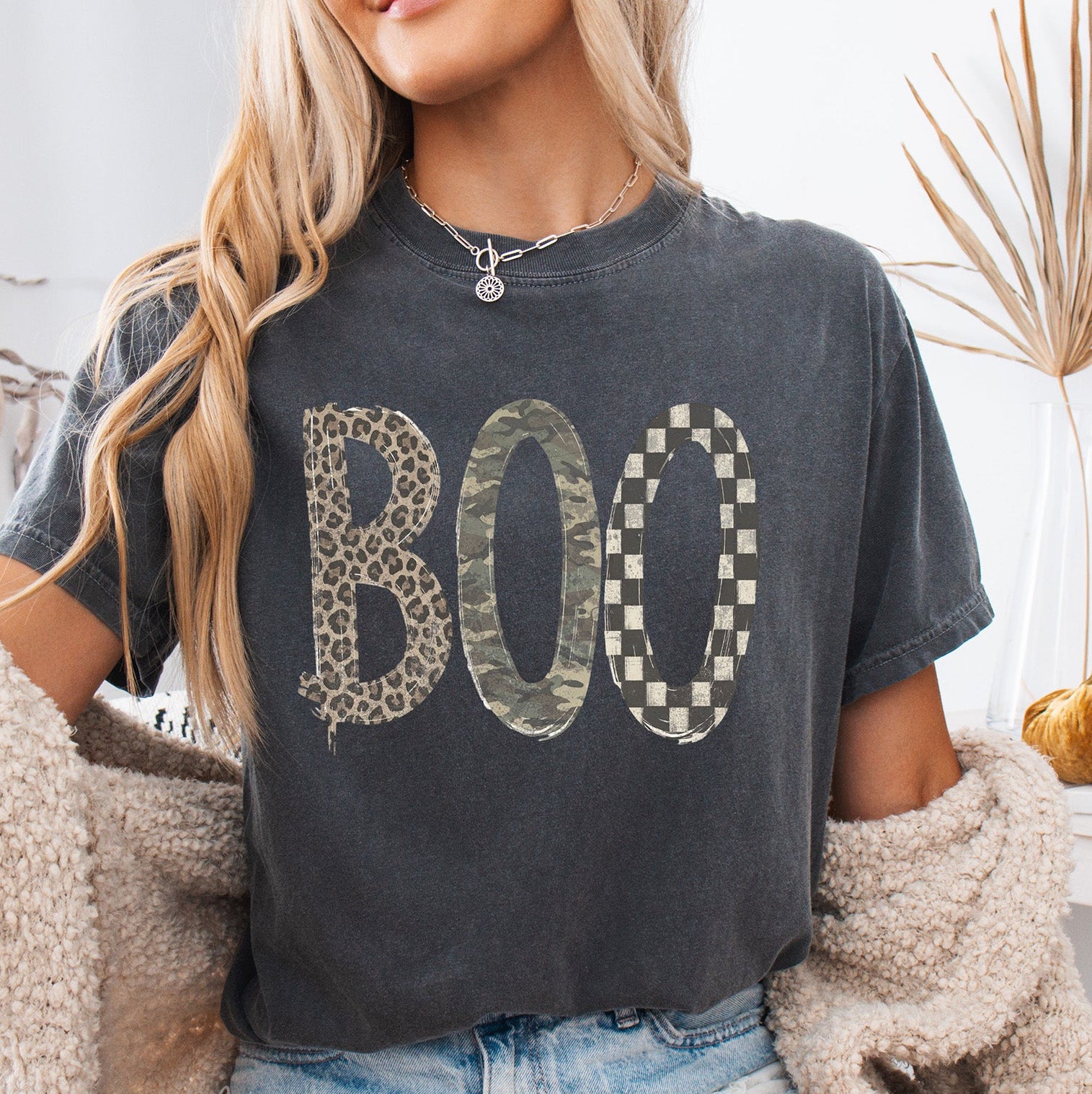 BOO Halloween DTF transfer with leopard print camouflage and black white checkered patterns
