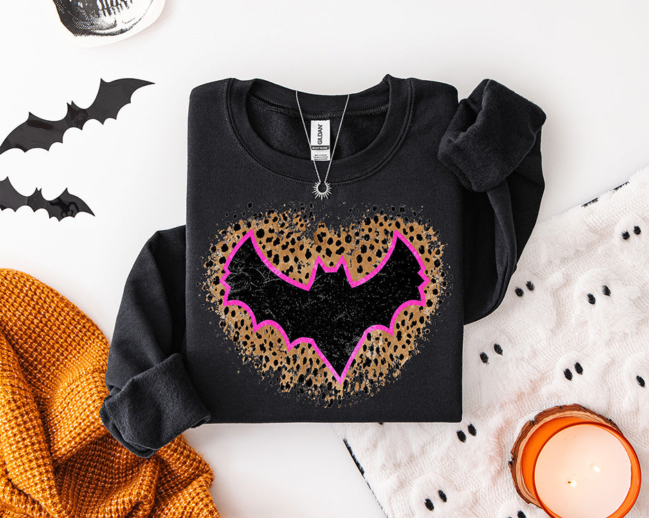 Pink leopard Halloween DTF transfer featuring a distressed black bat with hot pink outline inside a cheetah print heart