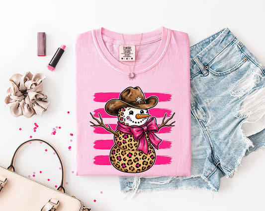 Cowgirl Snowman DTF transfer featuring a leopard print snowman with brown cowboy hat, hot pink bow and distressed pink stripes