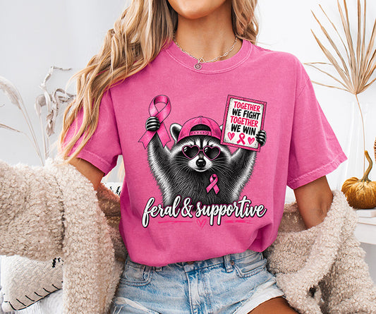 Feral and Supportive breast cancer awareness raccoon DTF transfer with pink ribbons and Together We Fight Together We Win sign