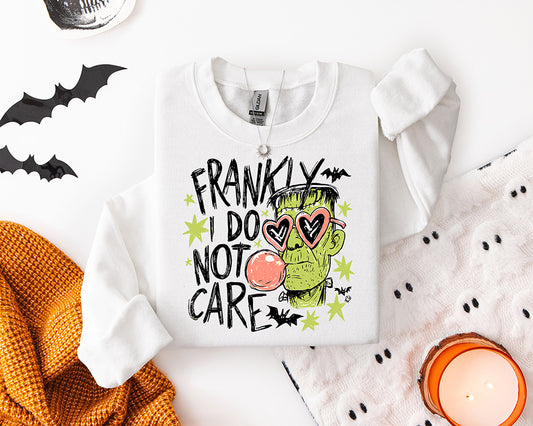 Frankly I Do Not Care Halloween DTF transfer featuring a Frankenstein-inspired green monster with pink heart sunglasses, bubblegum, bats and lime green accents
