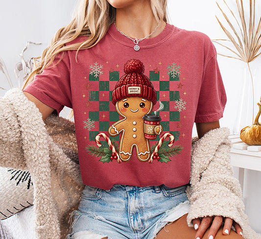 Cute gingerbread Christmas DTF transfer with red winter beanie coffee cup candy canes greenery and green checkerboard background