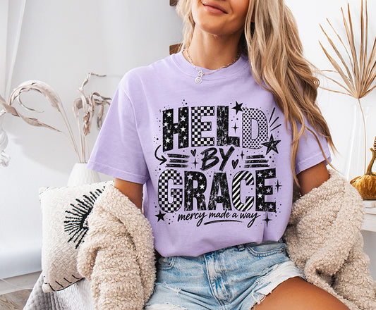 Held by Grace Mercy Made a Way Christian DTF transfer with black checkerboard, stars and distressed typography
