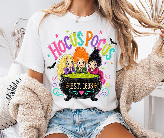 Colorful Hocus Pocus Halloween DTF transfer featuring three witches around a bubbling green cauldron with bats stars and bright lettering