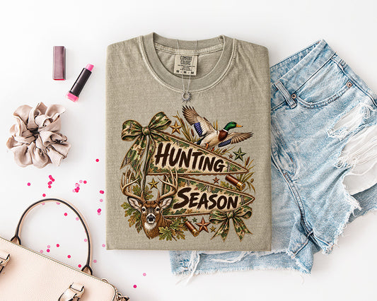 Hunting Season DTF transfer with whitetail buck, flying mallard duck, camouflage bows, antlers, shotgun shells and camo pennant banners