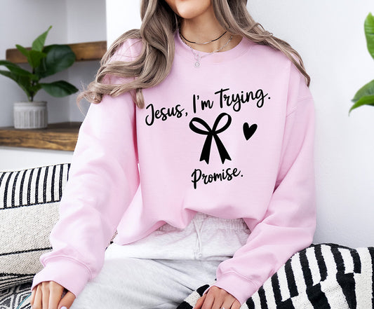 Jesus I’m Trying Promise Christian DTF transfer with black script lettering, bow and heart design