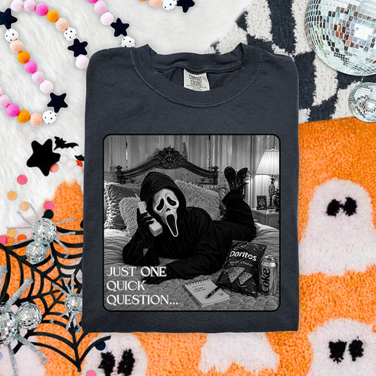 Just One Quick Question horror DTF transfer featuring masked spooky character lounging on a bed with phone snacks and soda