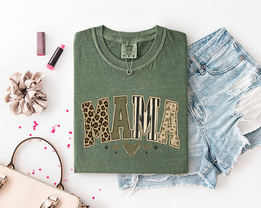 Mama DTF transfer with leopard print, neutral earth tone patterns, floral details and heart design on green shirt