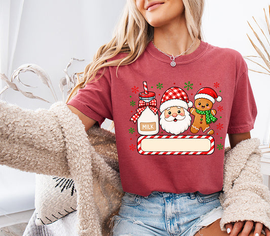Personalized Christmas DTF transfer featuring Santa, gingerbread character, milk bottle, snowflakes and candy cane custom name plate