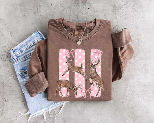 Pink bow deer DTF transfer featuring realistic whitetail bucks with pink and white polka dots and feminine coquette bows