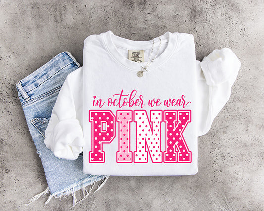 In October We Wear Pink DTF transfer featuring hot pink and light pink polka dot varsity lettering with feminine script