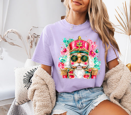 Colorful preppy pink Nutcracker Christmas DTF transfer with turquoise gold ornaments and sparkling holiday details