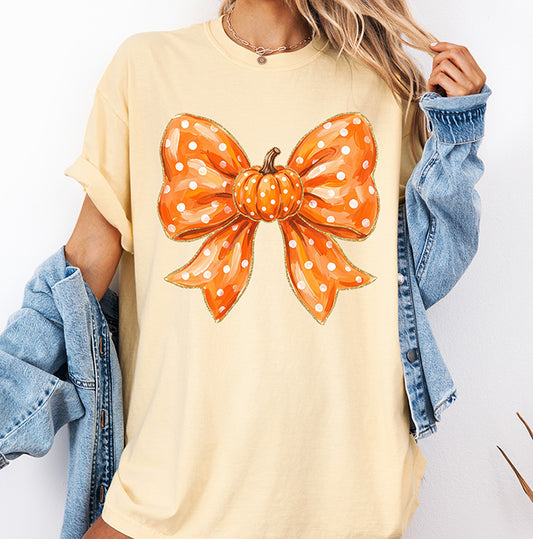 Orange polka dot pumpkin bow DTF transfer with watercolor style bow and pumpkin center for fall apparel