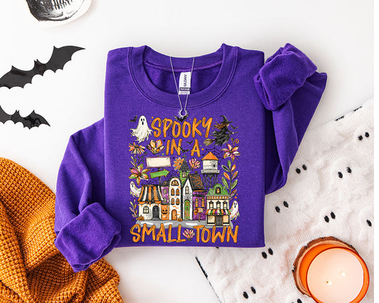 Spooky in a Small Town Halloween DTF transfer with colorful small town buildings cute ghosts bats flowers and spooky season details