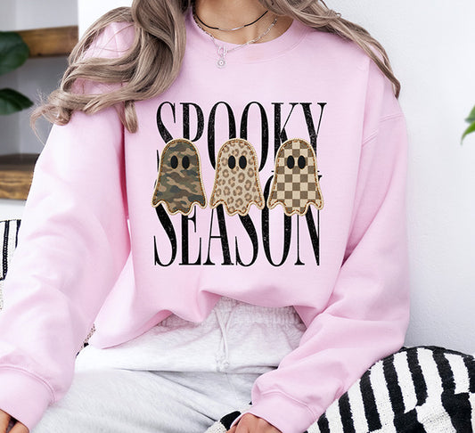 Spooky Season Halloween DTF transfer with camo leopard and checkerboard ghosts with faux stitched details and distressed black lettering