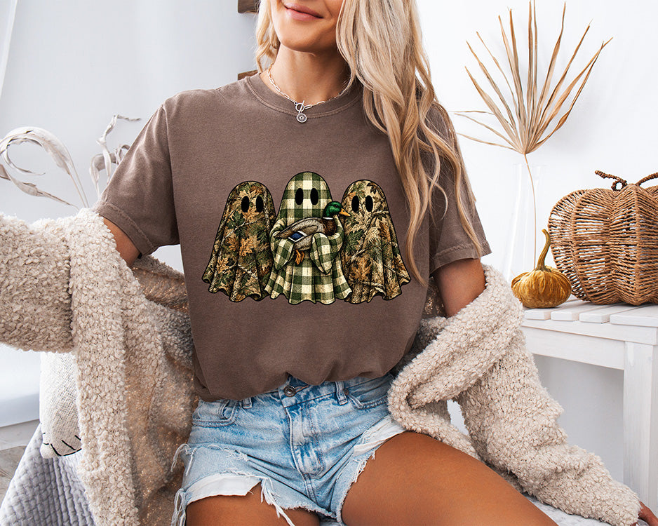 Camo ghost duck hunting DTF transfer featuring three woodland camouflage and green buffalo plaid ghosts with a mallard duck for hunting season apparel.