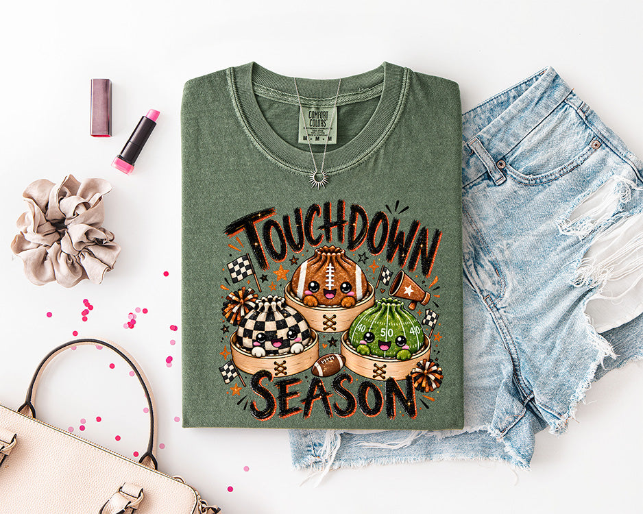 Touchdown Season cute football DTF transfer with squishy football characters, checkerboard flags, pom poms and orange black game day details