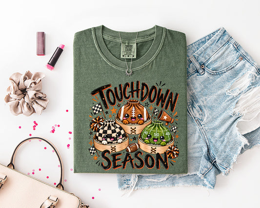 Touchdown Season cute football DTF transfer with squishy football characters, checkerboard flags, pom poms and orange black game day details