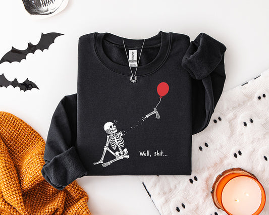 Funny skeleton Well Shit DTF transfer with skeleton arm floating away on a red balloon